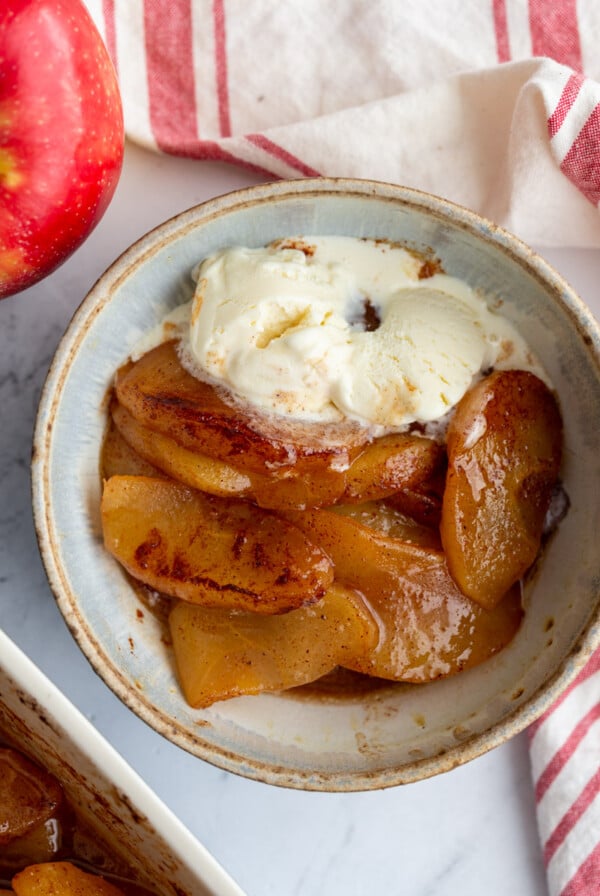 Baked Cinnamon Apples topped with vanilla ice cream