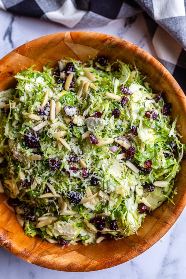 Brussel Sprout Salad topped with cranberries and almonds