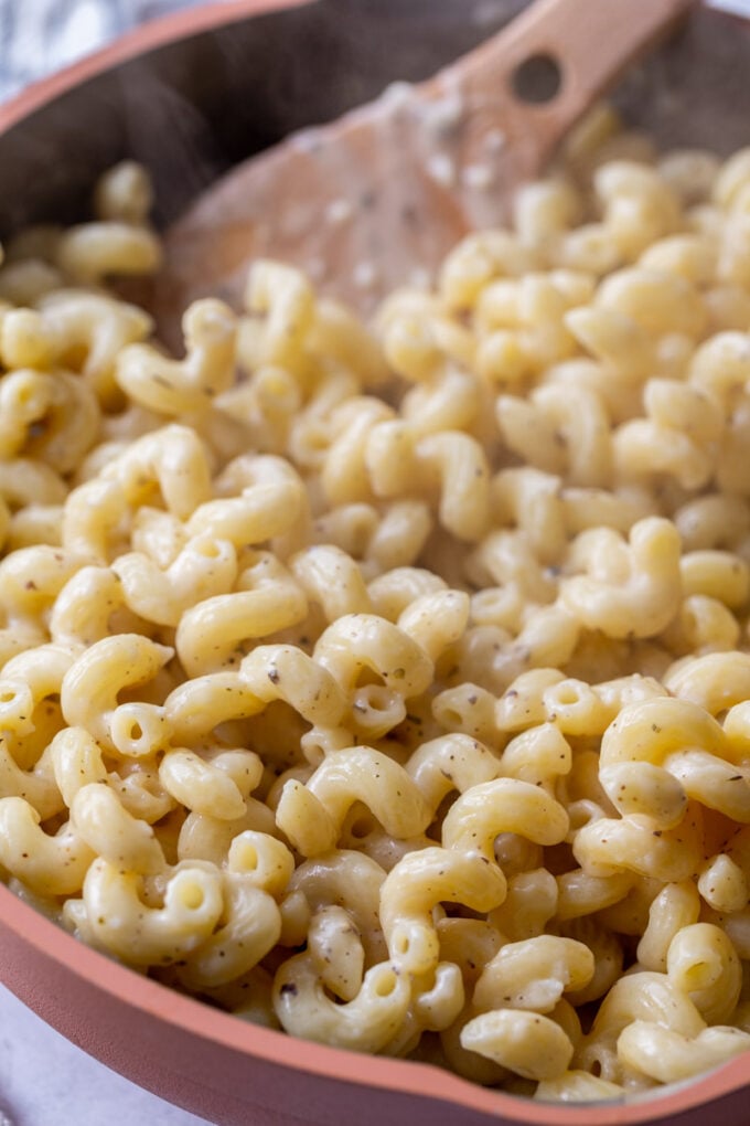 cooking cavatappi pasta in a large skillet