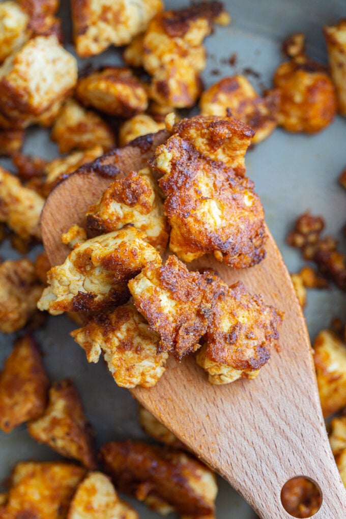 close up shot of chipotle tofu chunks in a skillet