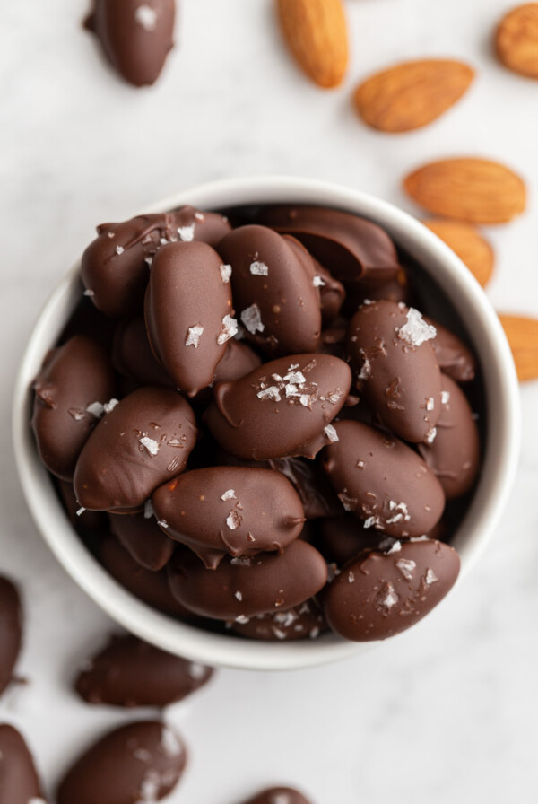 Chocolate Covered Almonds in a small white bowl