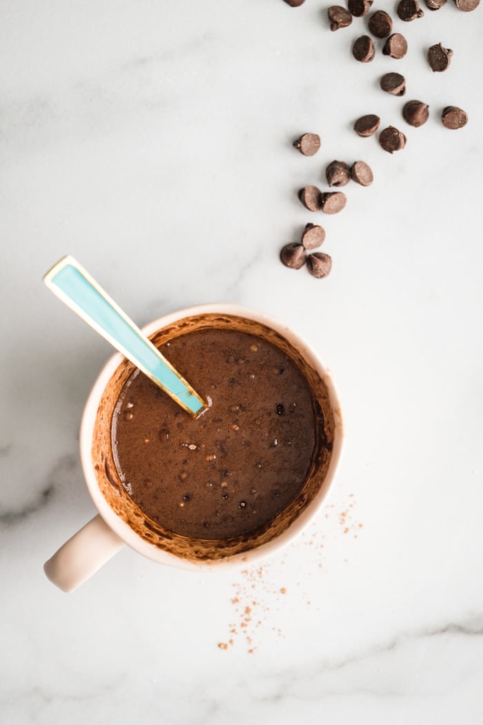 chocolate cake batter in a mug