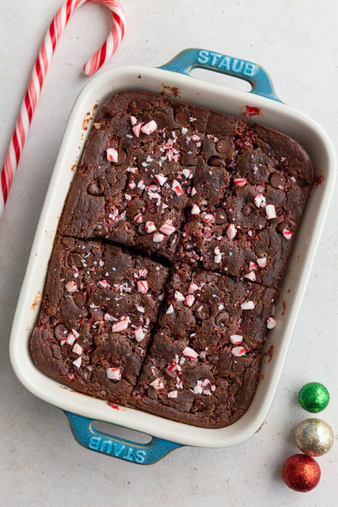 chocolate peppermint baked oats topped with crushed peppermint in a small casserole dish