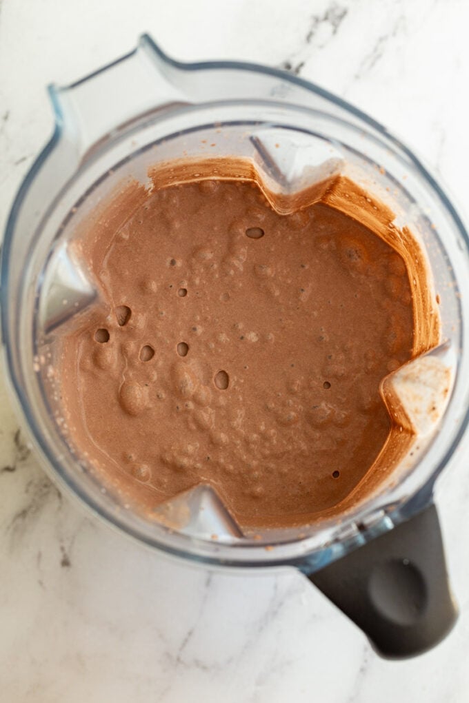 chocolate ice cream in a blender before it's been frozen