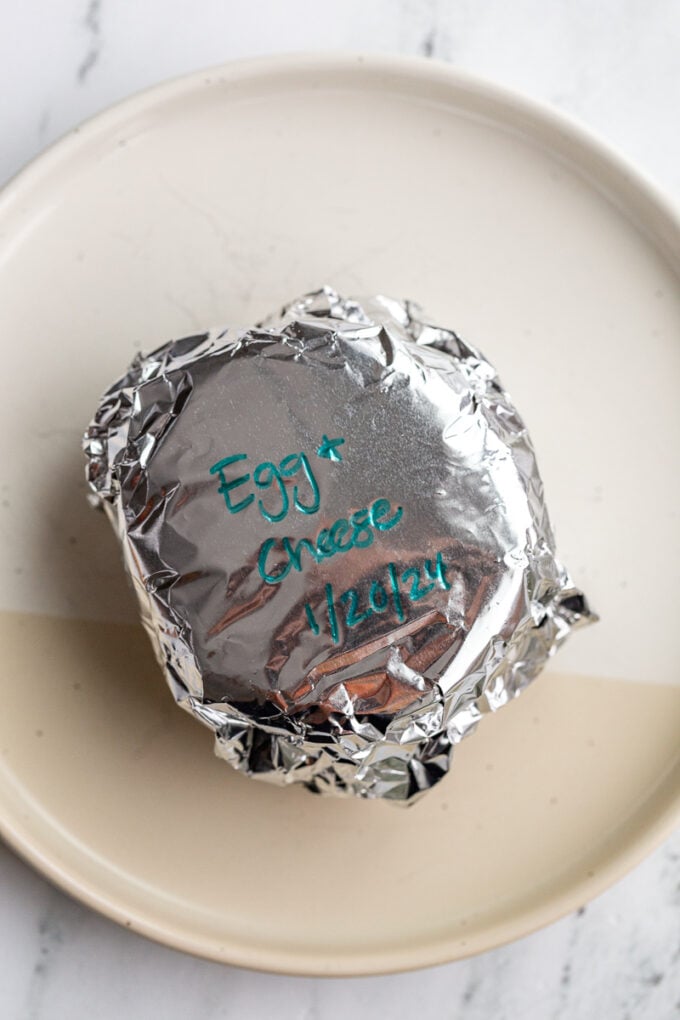 sandwich wrapped in foil and labeledd " Egg & Cheese 1/20/24"