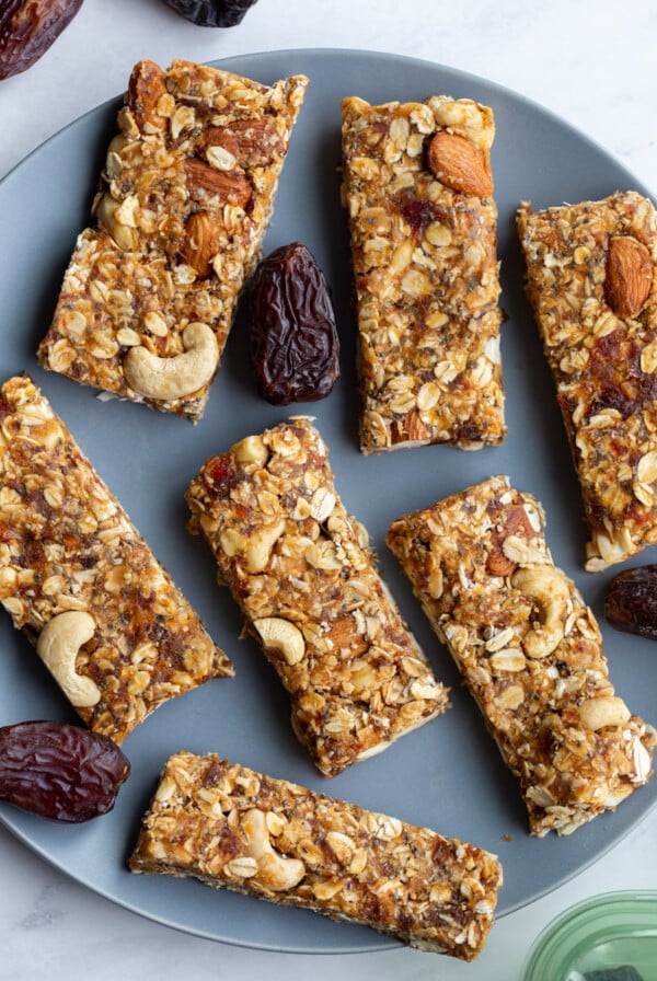 chewy granola bars on a blue plate