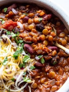 vegetarian chili served in a bowl with a spoon