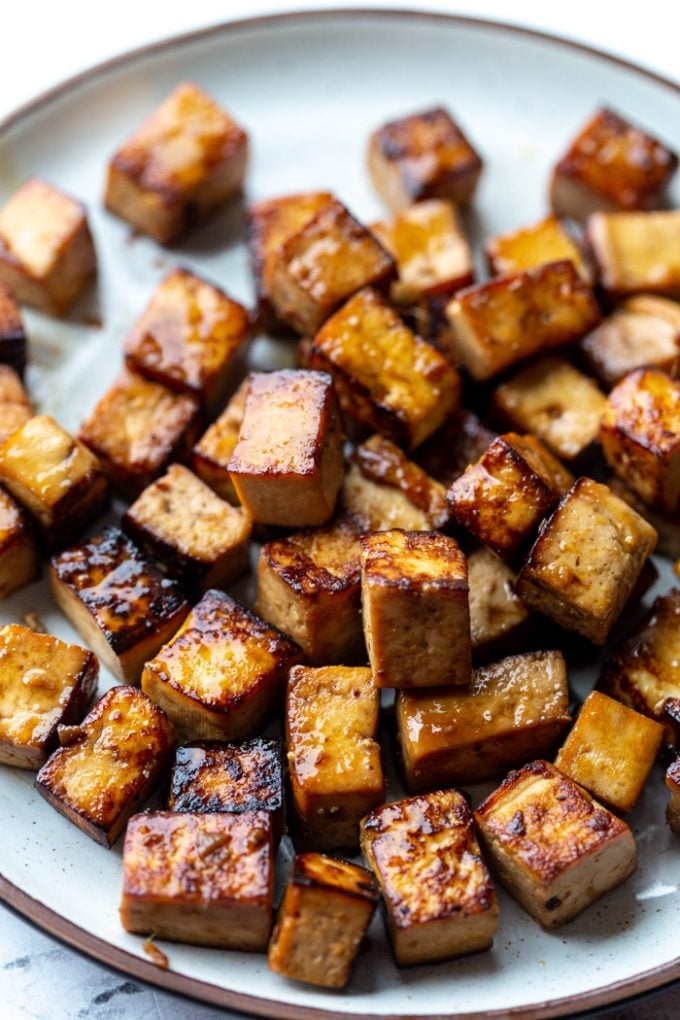 marinated baked tofu on a plate 