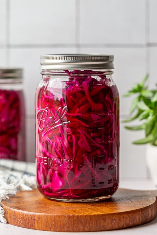 Pickled cabbage in a glass mason jar.