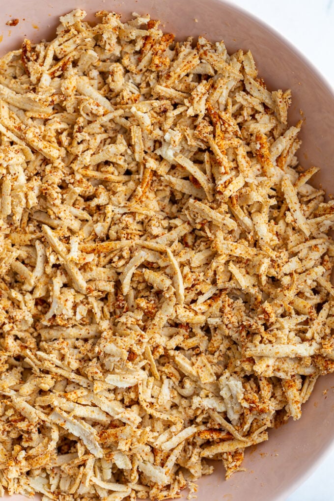 shredded tofu taco "meat" in a bowl before it's been cooked.