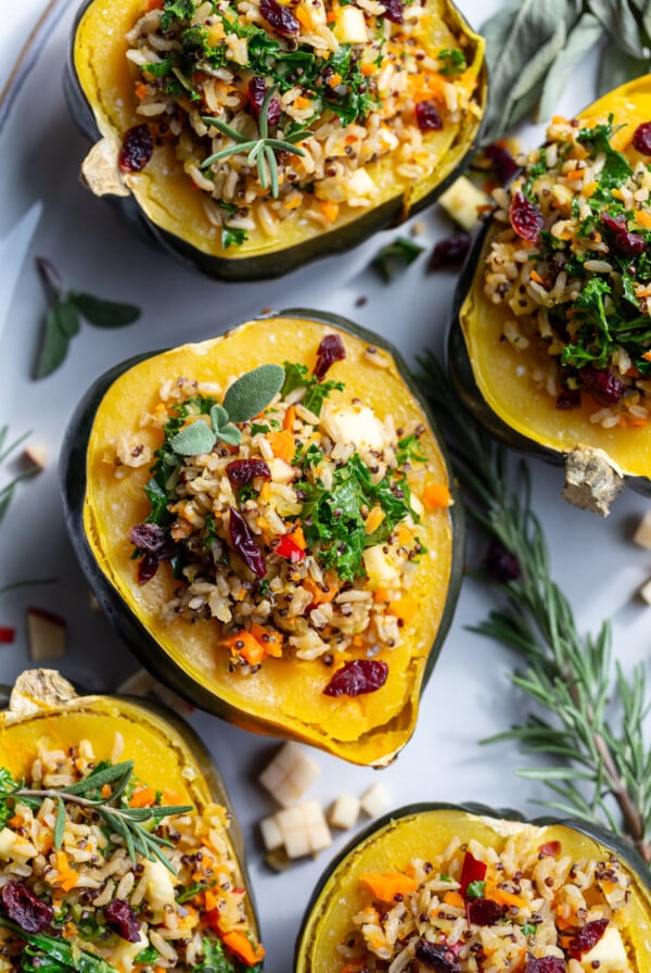 vegetarian stuffed acorn squash toped with cranberries