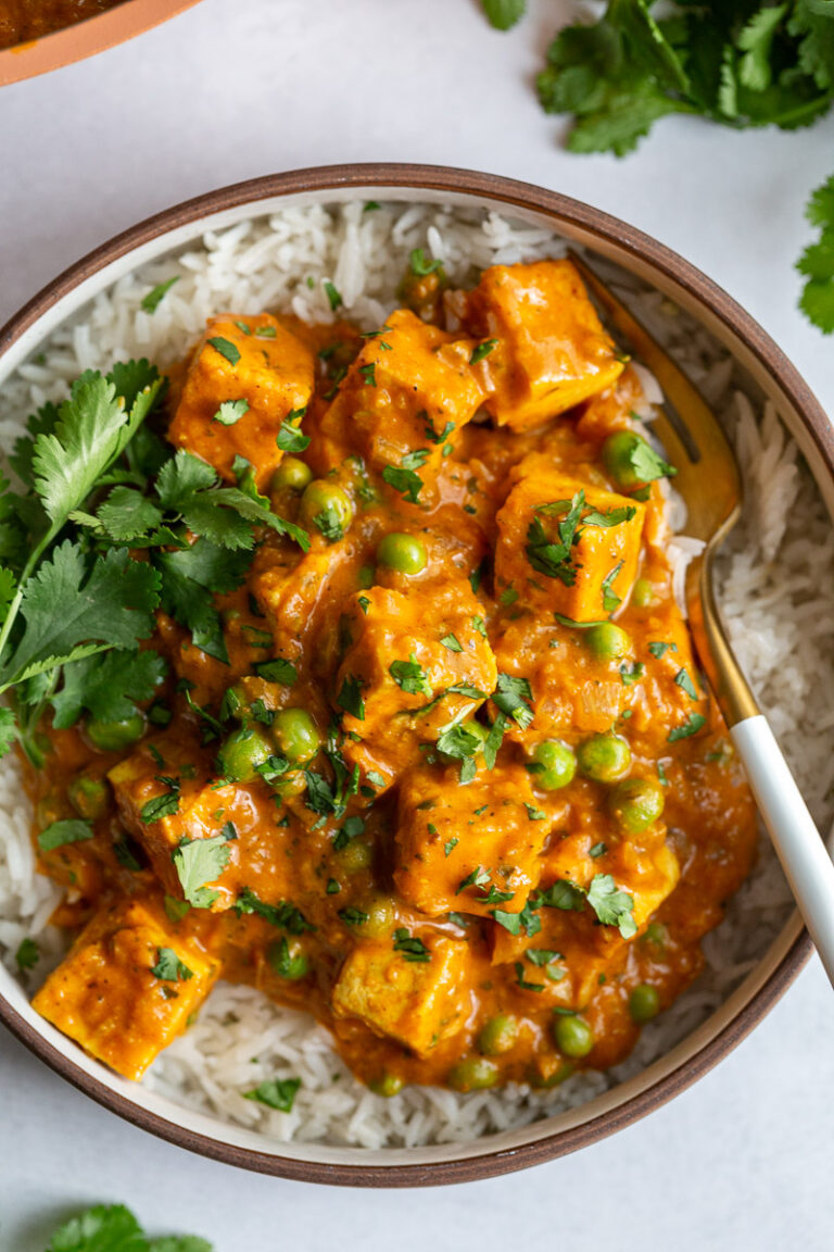 tofu tikka masala in a large bowl with fresh cilantro on top