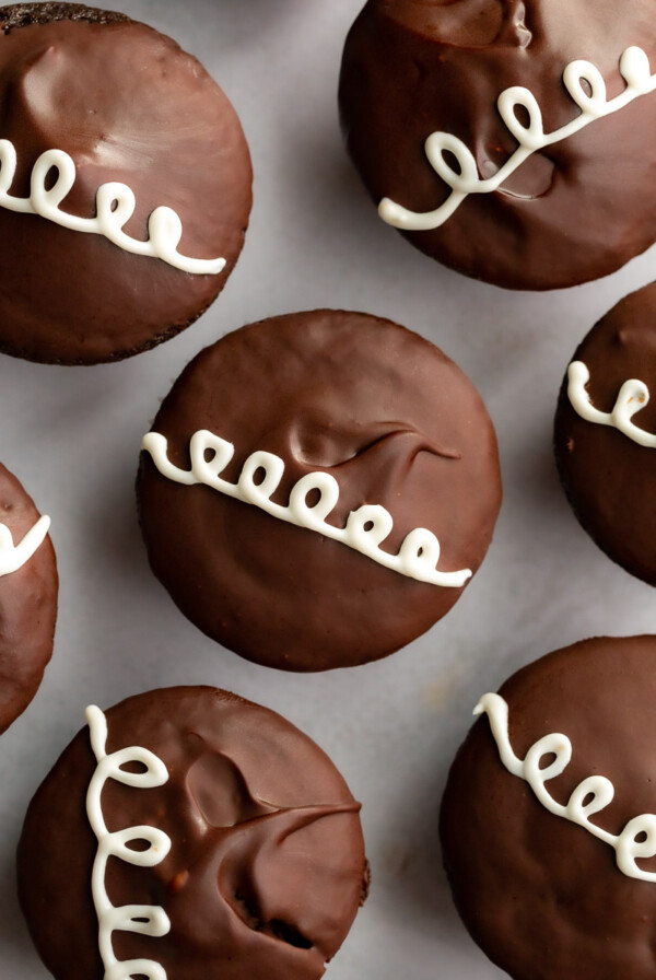 chocolate hostess cupcakes from the top down with white swirled frosting on top