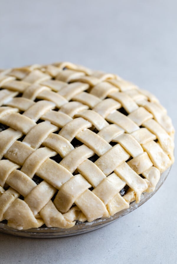 side shot of a lattice pie unbaked