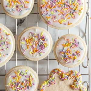 iced sugar cookies on a wire cooling rack