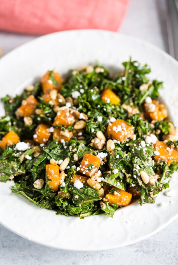 kale salad with butternut squash on top