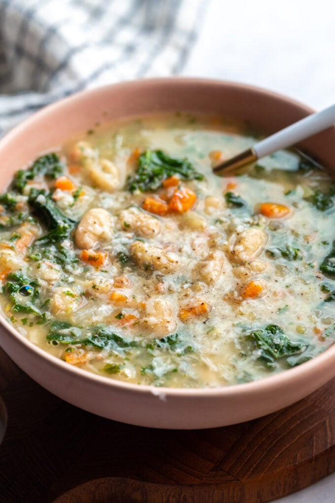 bowl filled with white bean and kale soup